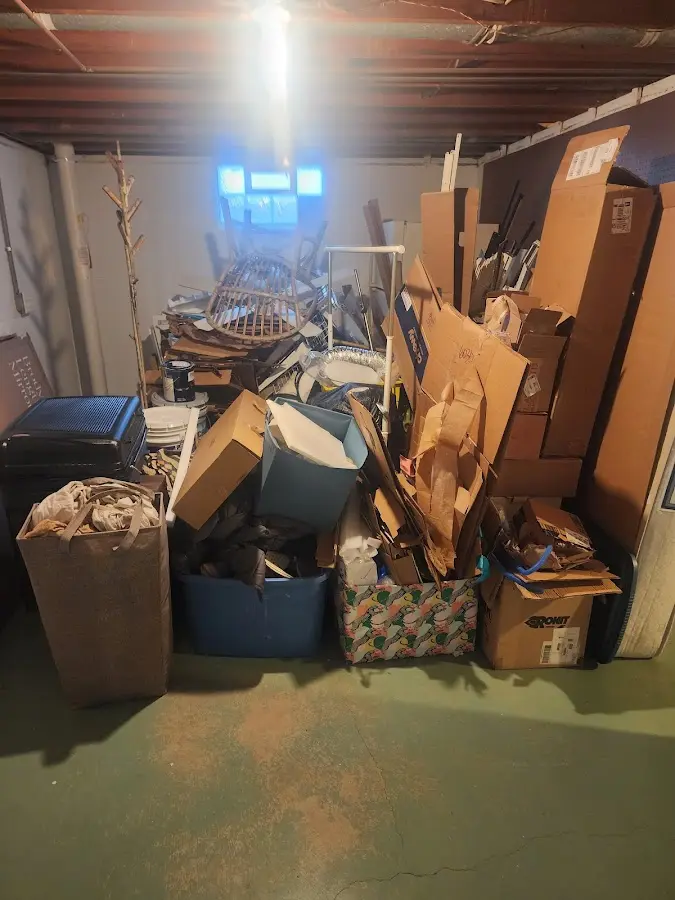 Roll-off dumpster container at job site for Yard Waste Dumpster Rental in Madawaska